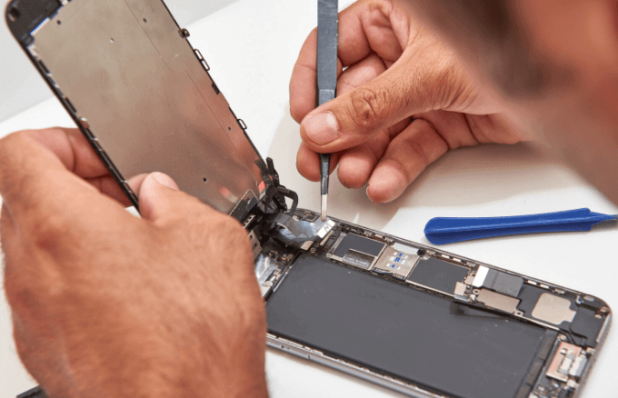 Someone repairing an iPhone